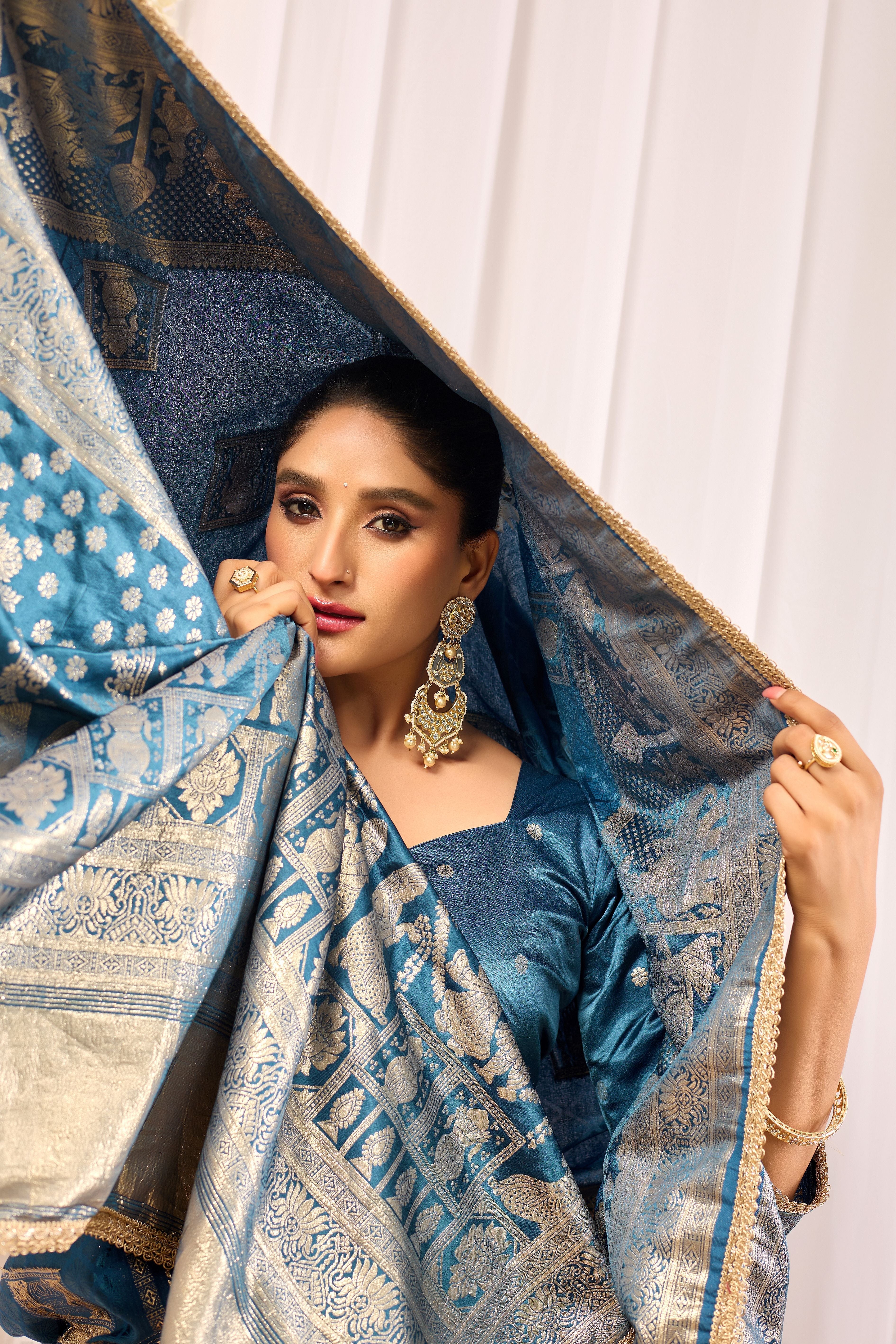 Teal Blue Soft Silk by Icultuer with Intricate Woven Motifs, Rich Zari Border and Designer Traditional Pallu