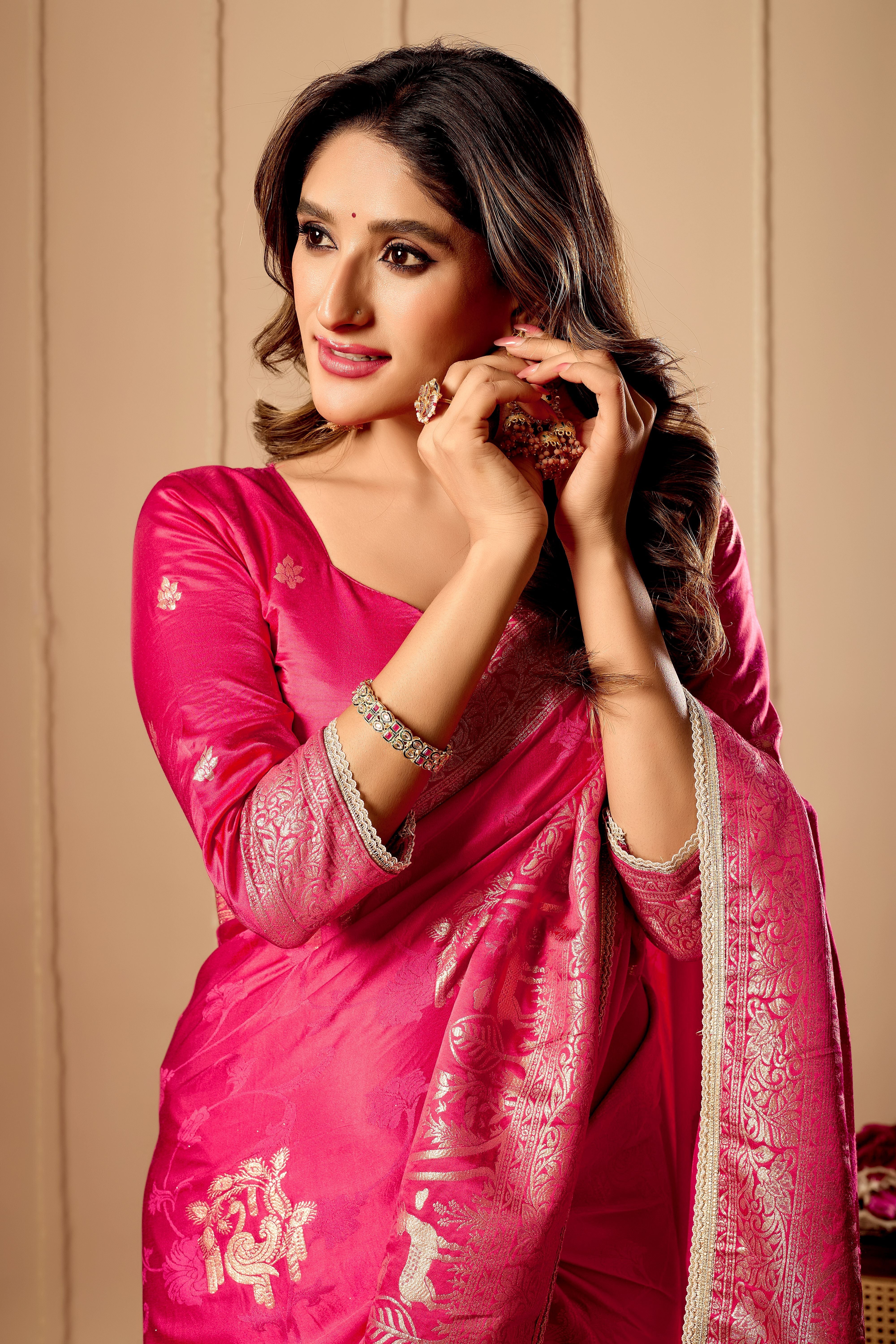 Vibrant Rani Pink  satin Silk by Icultuer with Rich Gold Zari Weaving and Elegant Traditional Motifs