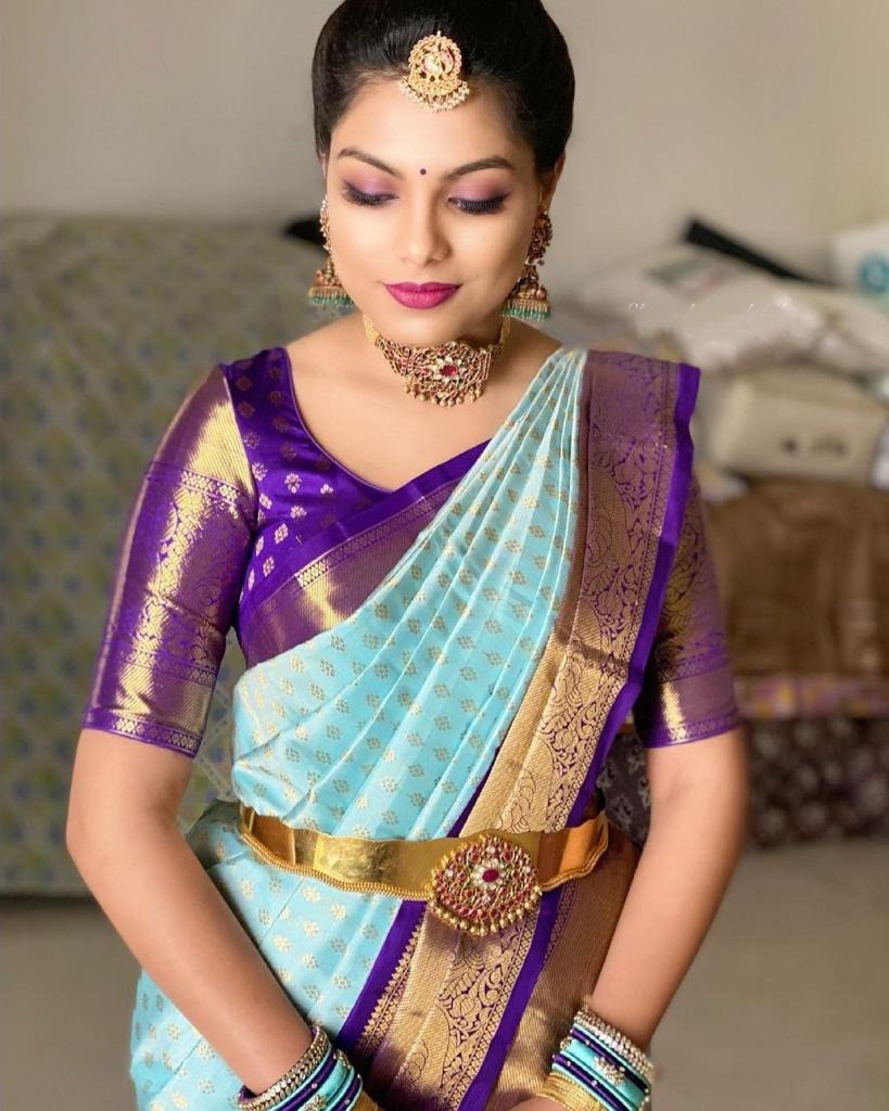 Firozi Soft Banarasi Silk Saree with Purple Jacquard Blouse
