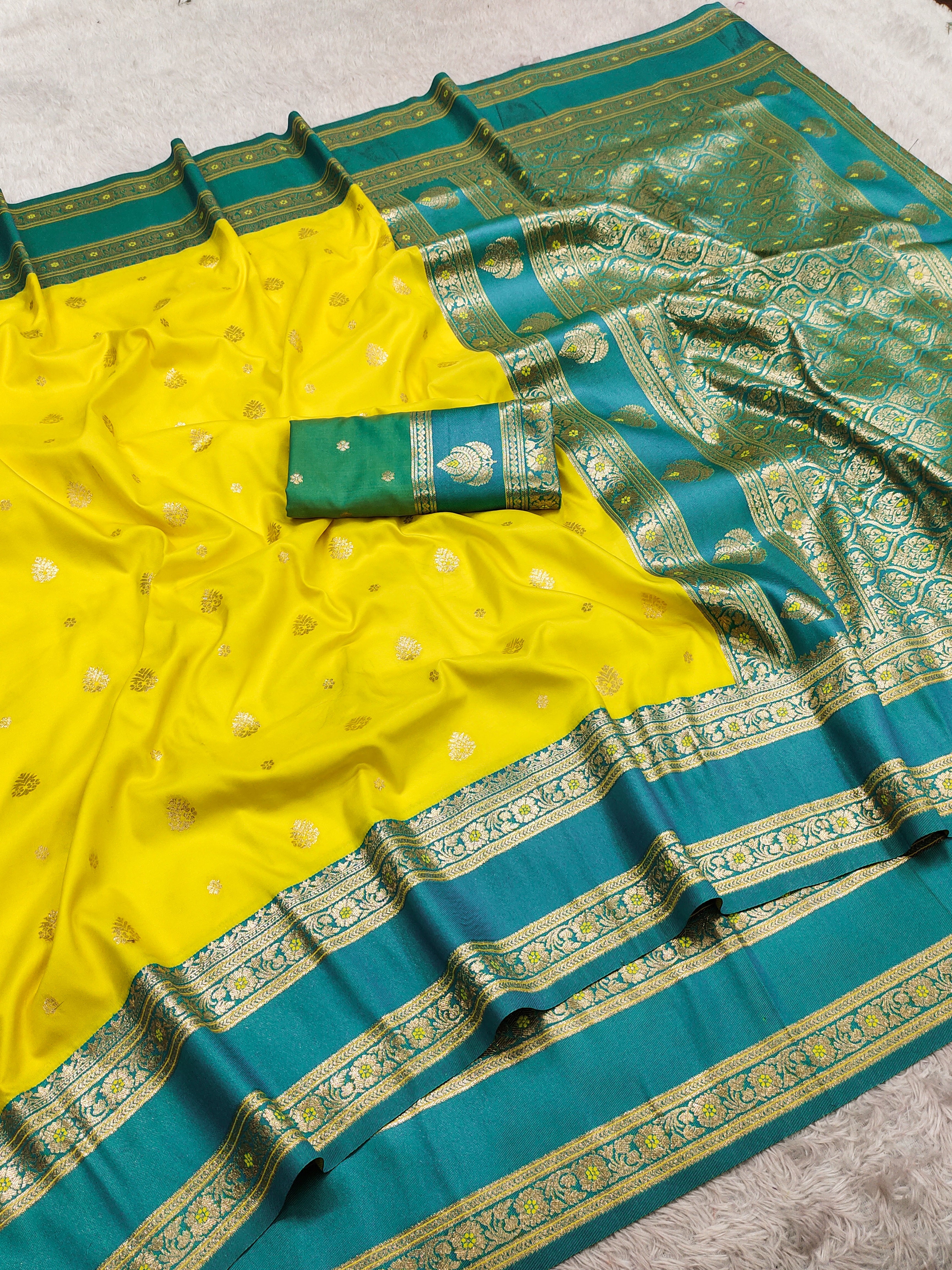 Bright Yellow Silk Saree with icultural Green icultural Zari Border & Rich Woven Pallu