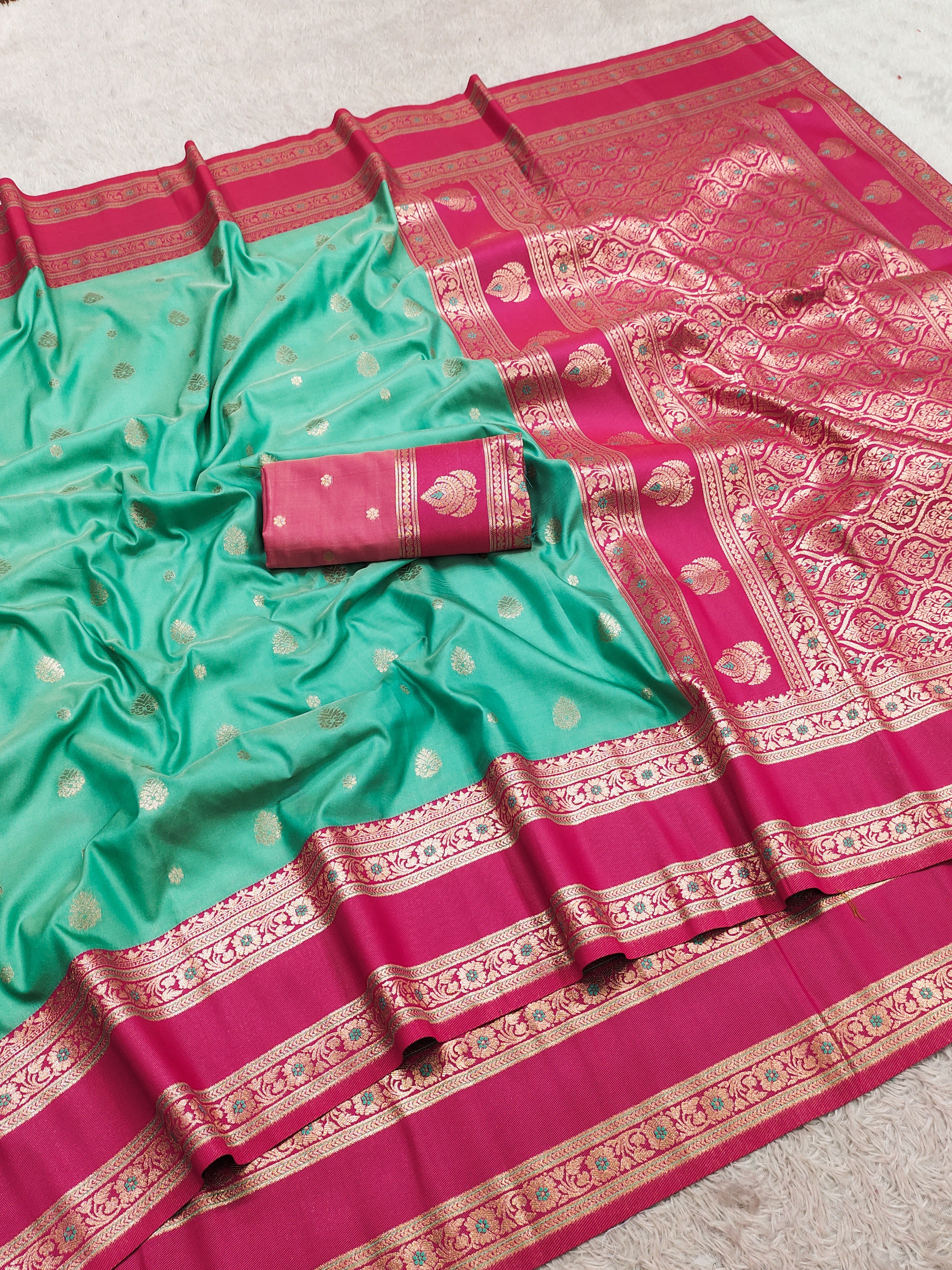 Sea Green Silk Saree with Rani Pink icultural Zari Border & Rich Woven Pallu