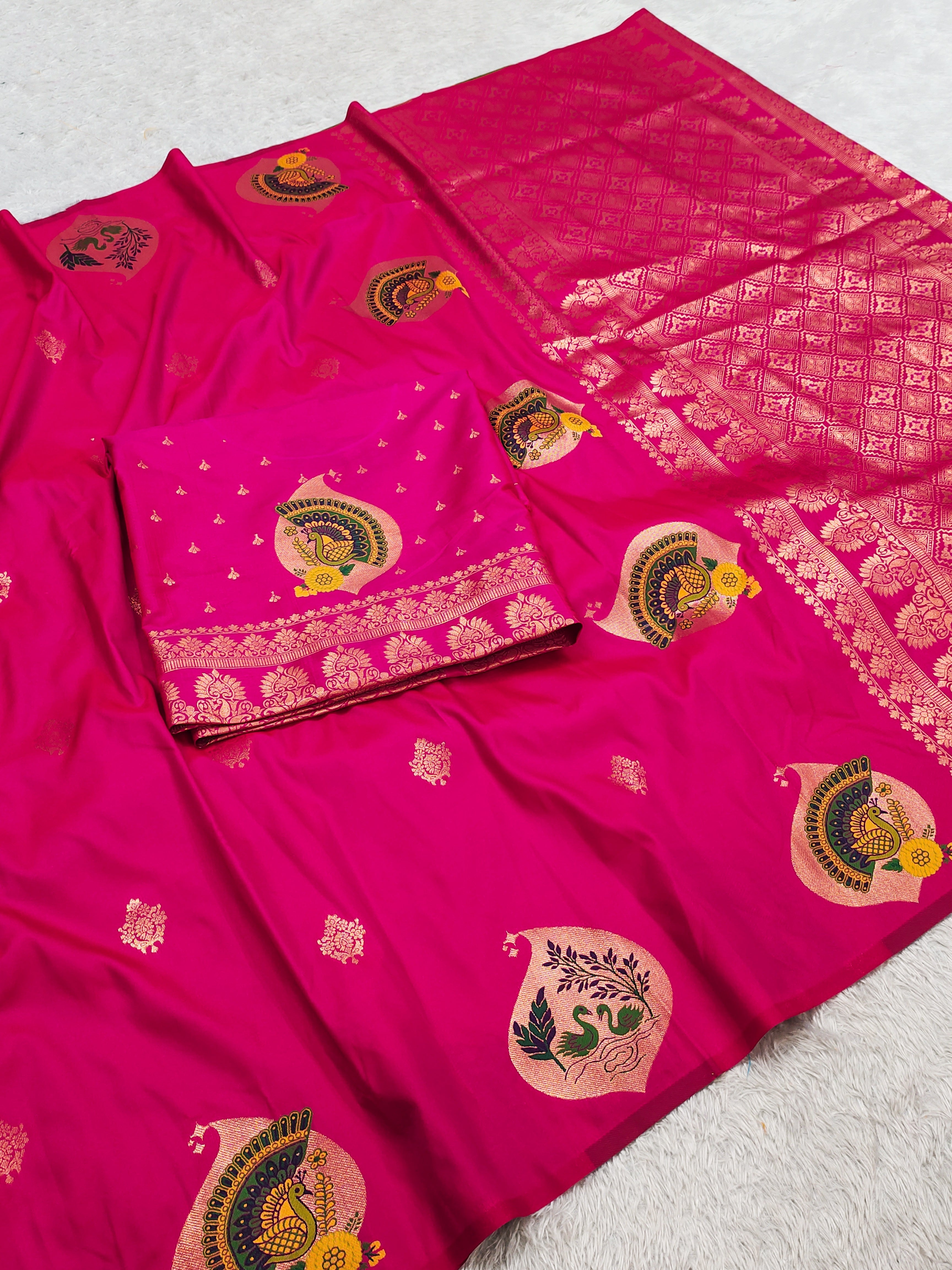 Rani Pink Banarasi Silk Saree with Royal Peacock Motifs and icultural Gold Zari Pallu