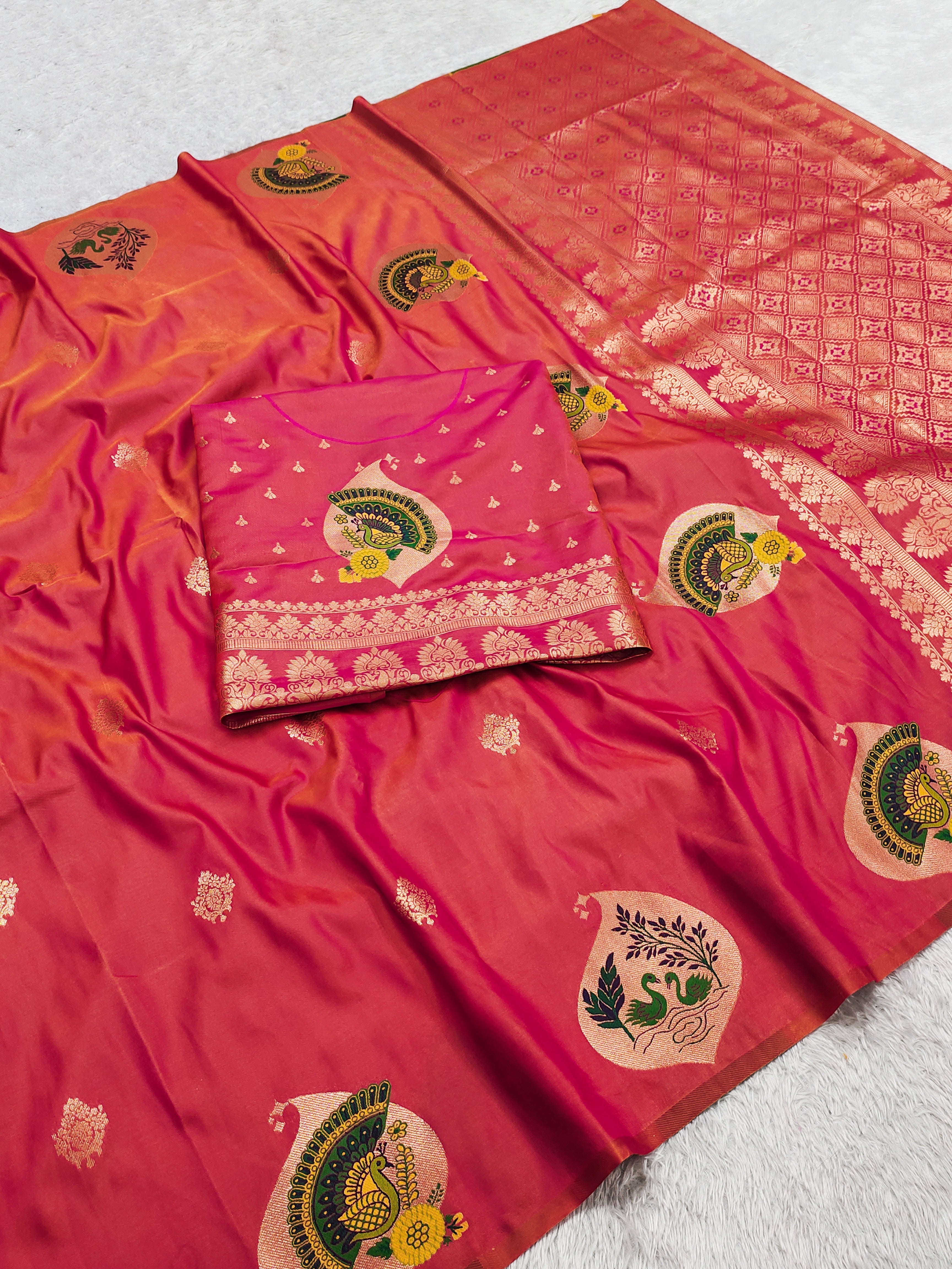 Coral Pink Banarasi Silk Saree with Royal Peacock & Swan Motifs and icultural Zari Pallu