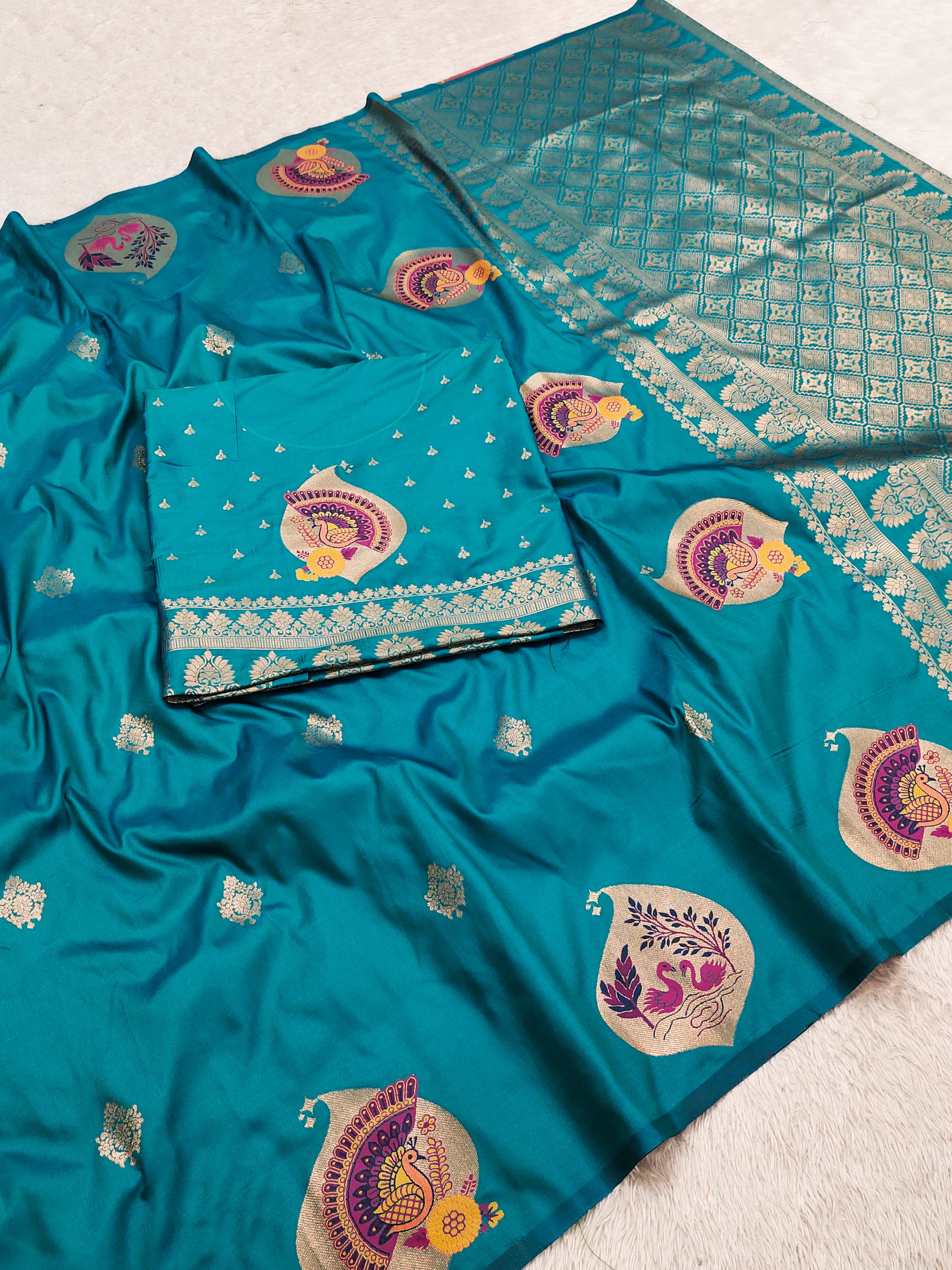 icultural Blue Banarasi Silk Saree with Peacock, Kalash & Swan Motifs and Rich Zari Pallu