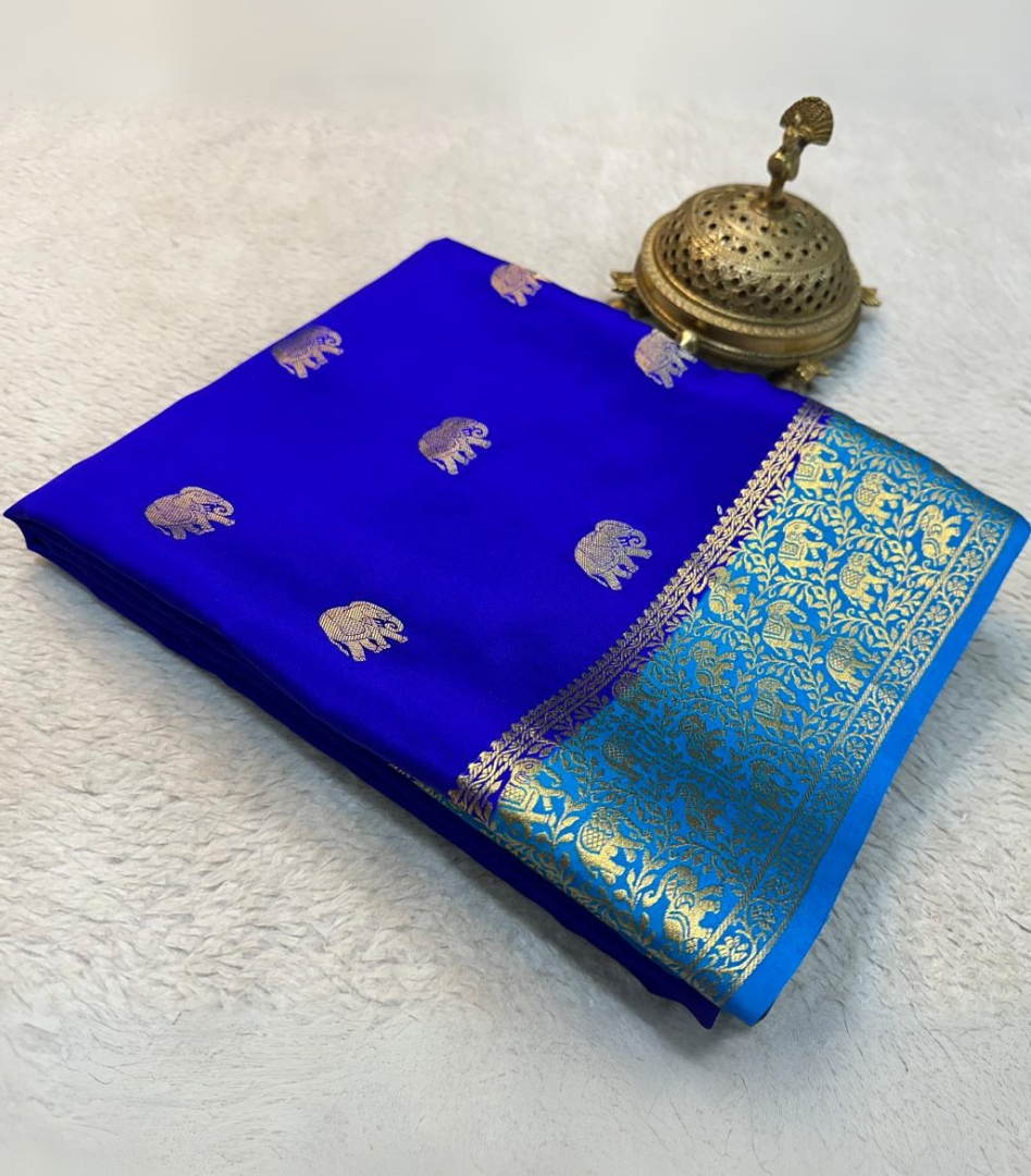 Soft mysore silk by Icultuer with elephant zari and contrast border