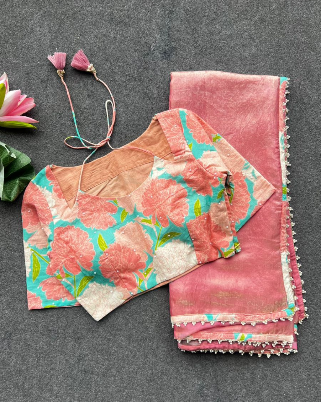 Peach Tissue silk by Icultuer with floral Hand Work Blouse.