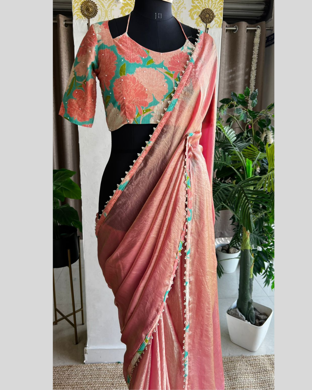 Peach Tissue silk by Icultuer with floral Hand Work Blouse.