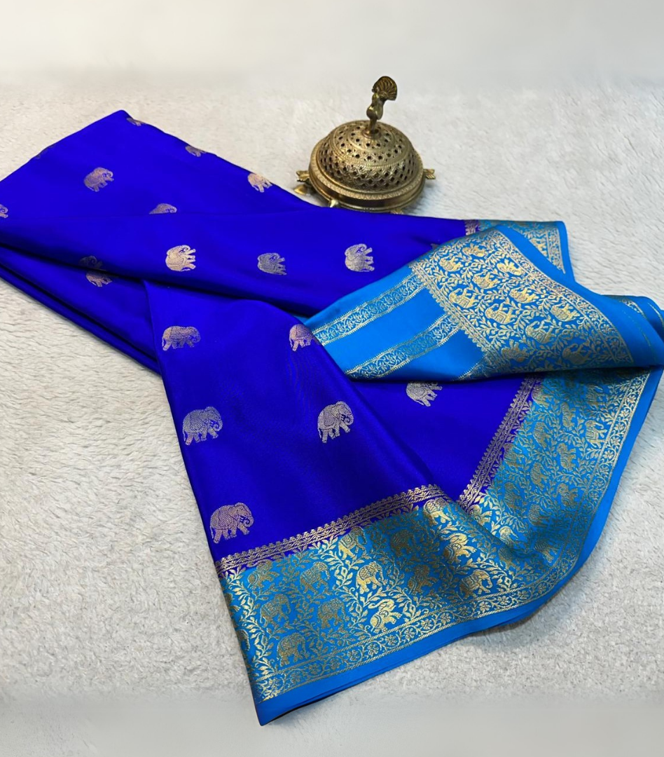 Soft mysore silk by Icultuer with elephant zari and contrast border