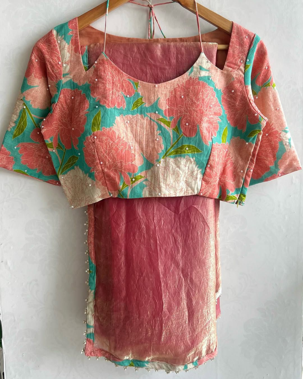 Peach Tissue silk by Icultuer with floral Hand Work Blouse.