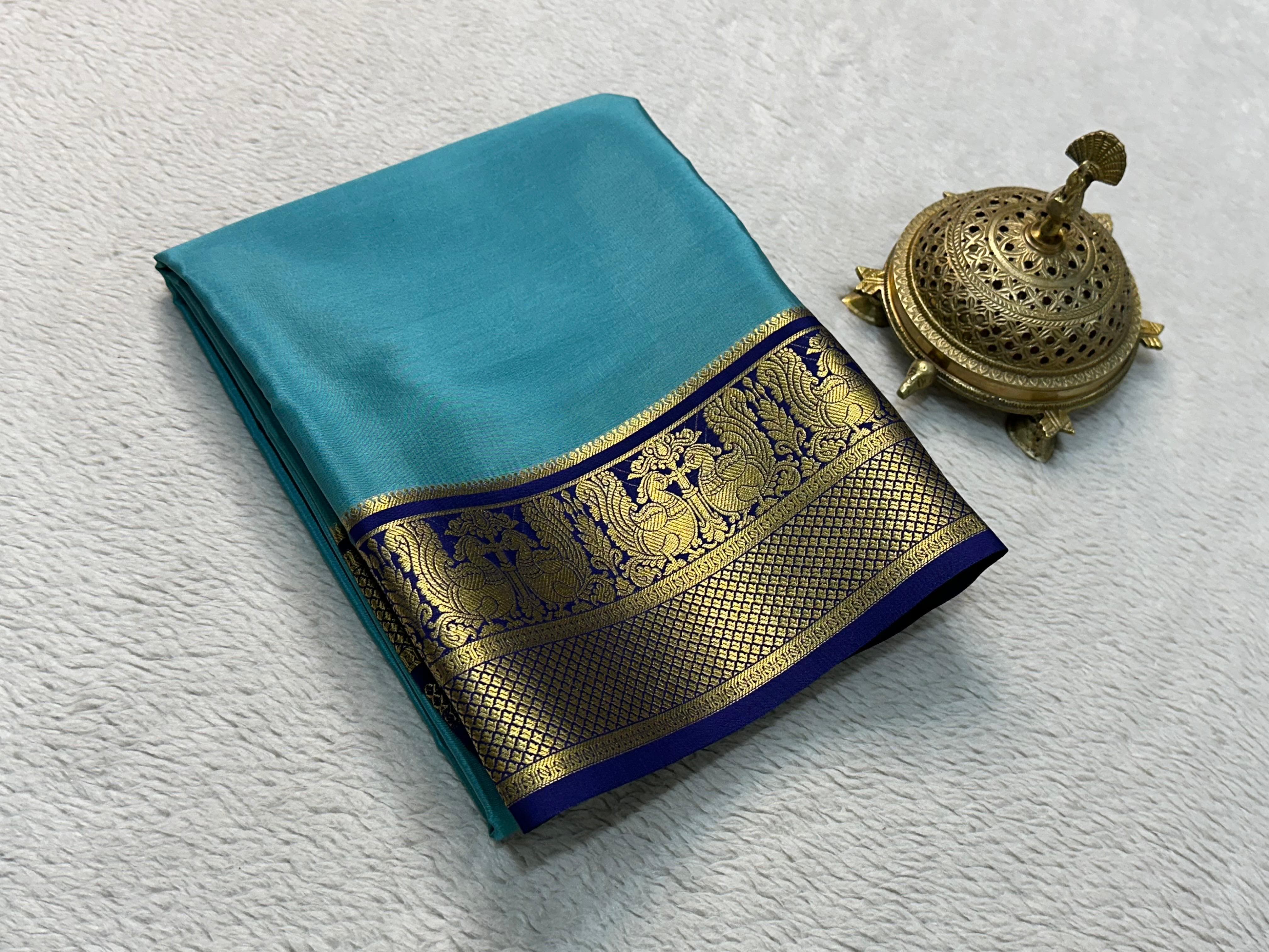 Grace the Occasion with Our Enchanting Rich Peacock Border Sarees