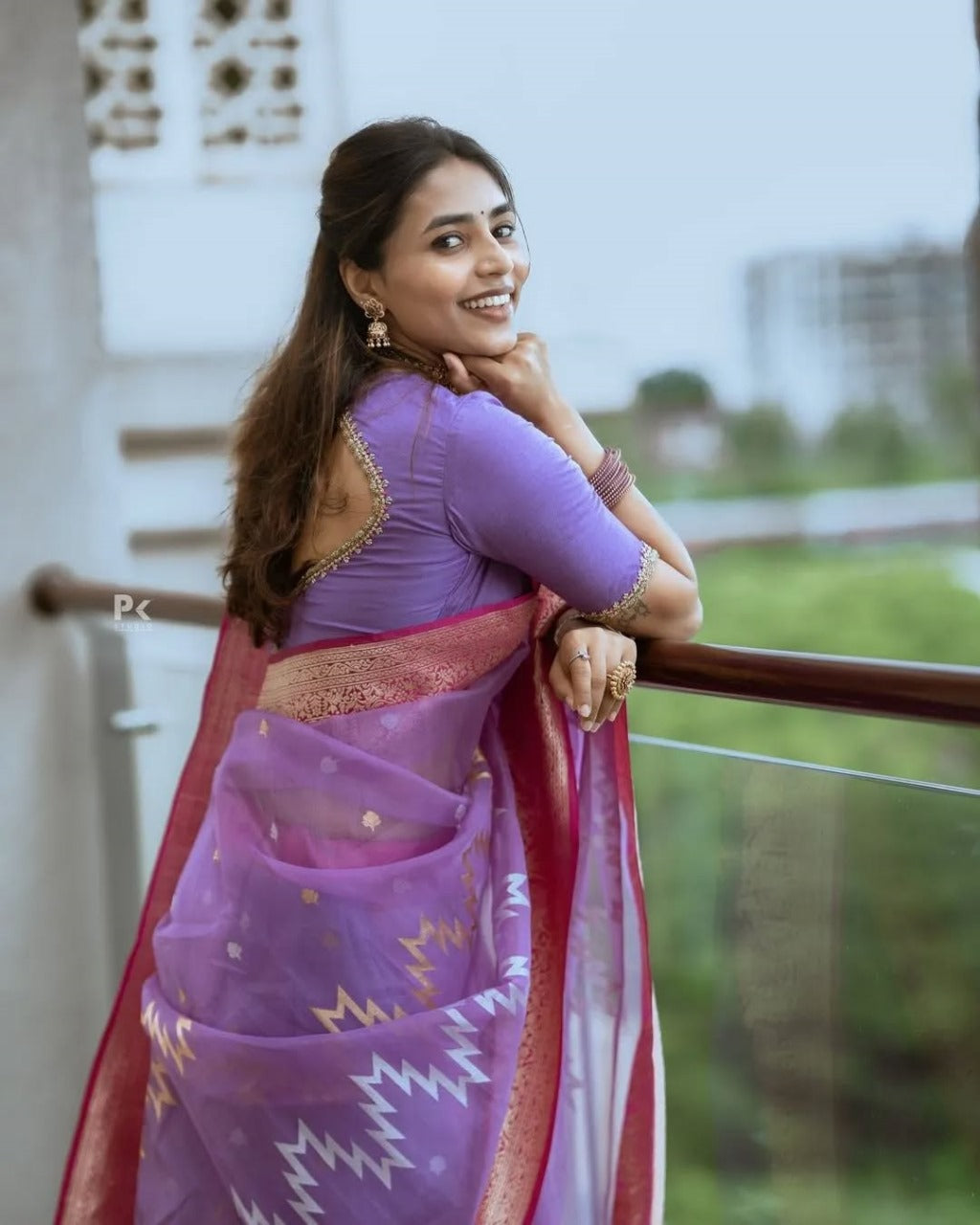 icultural Sheer Saree with Pink Zari Border & Ikat Motifs