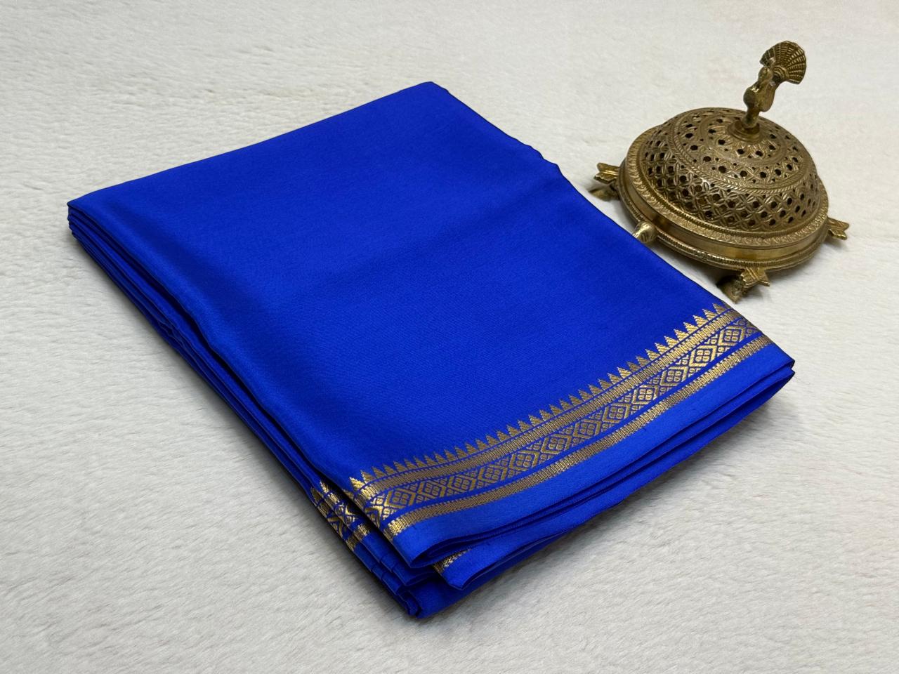 Heritage Inspired Soft Silk Saree Featuring Temple Motif Zari Border Design