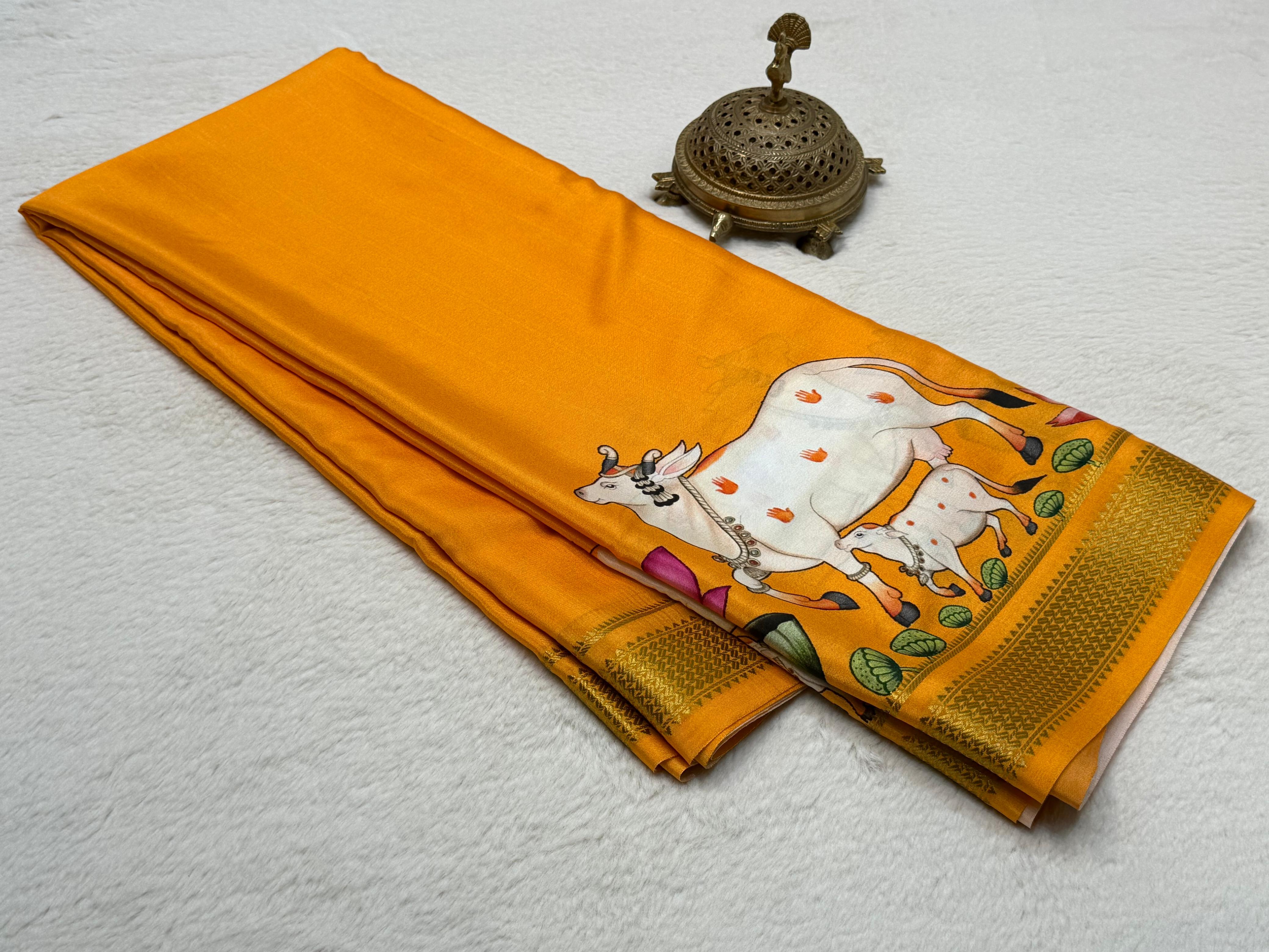 Sacred Cow Motif Hand Illustrated Silk Blend Saree with Traditional Gold Woven Border