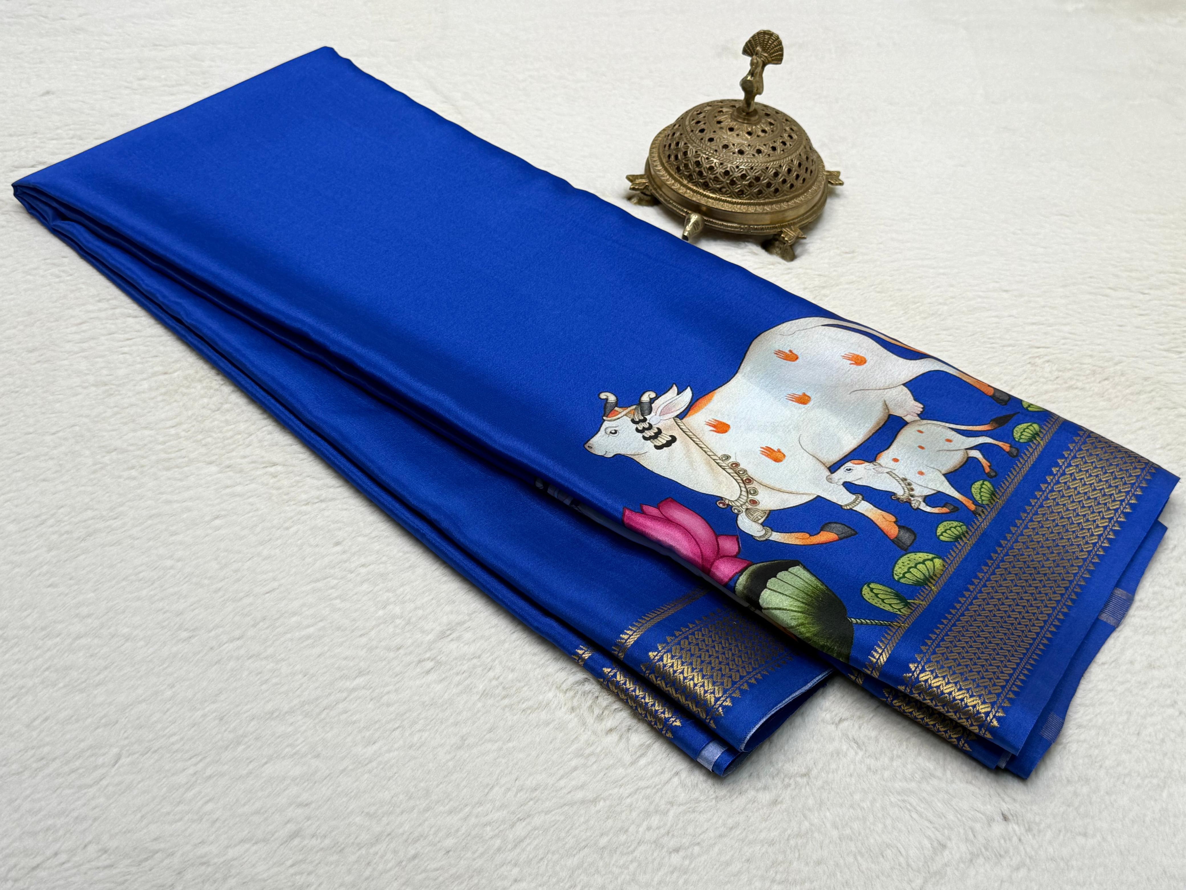 Sacred Cow Motif Hand Illustrated Silk Blend Saree with Traditional Gold Woven Border
