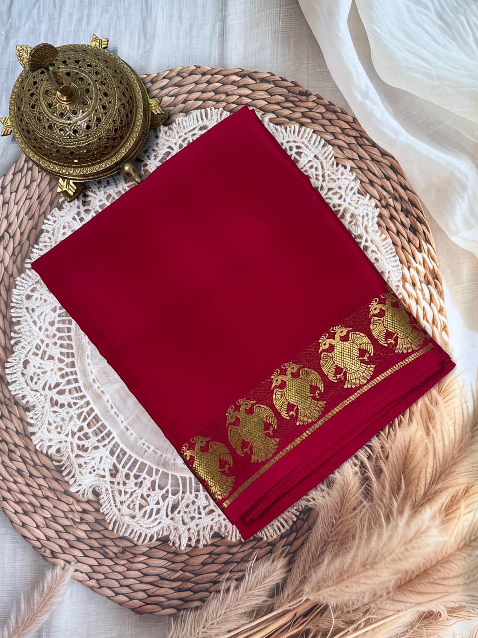Pure Mysore Silk by Icultuers having gandaberunda border in beautiful red colour