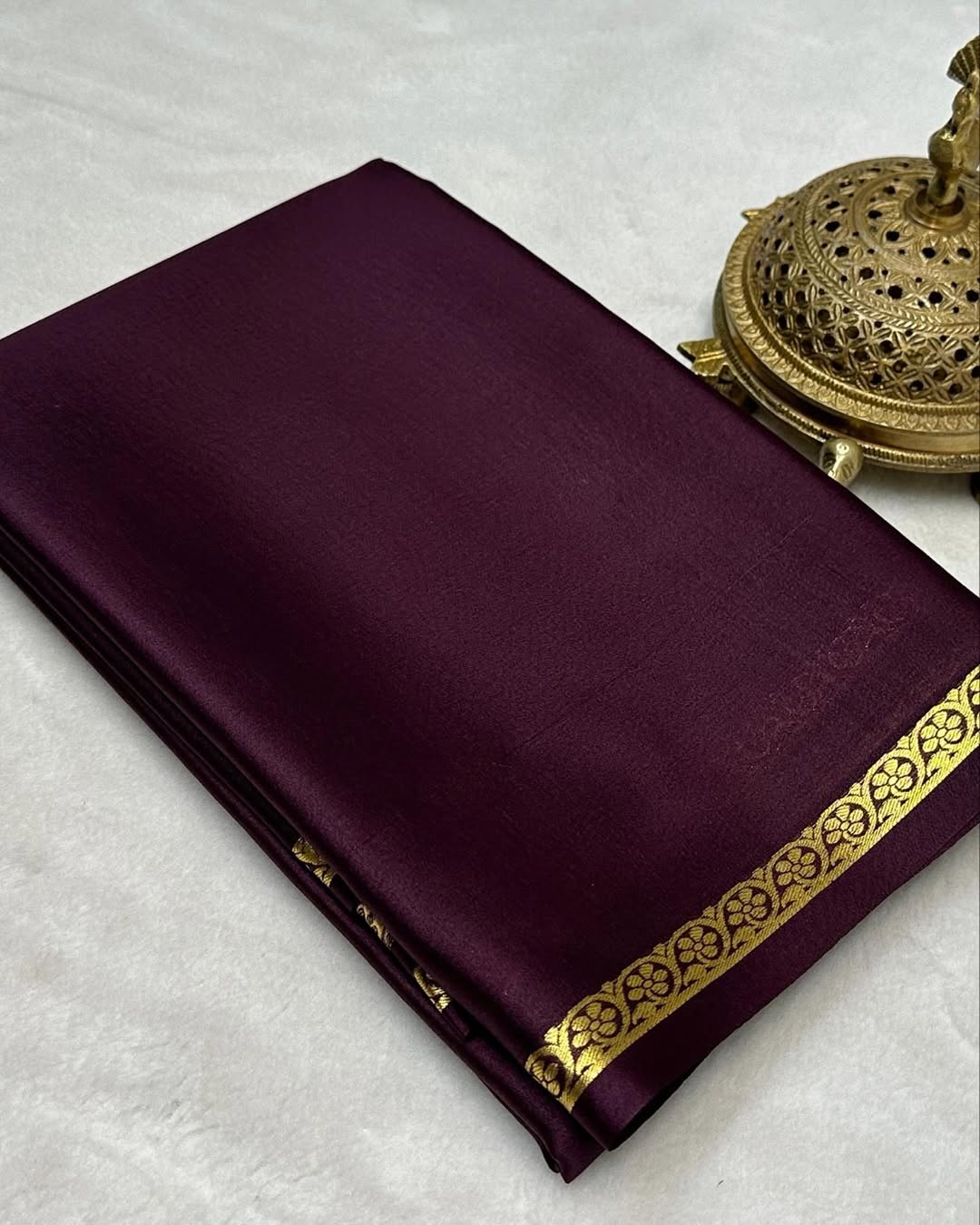 Elegant Solid Silk Blend Saree Featuring Rich Traditional Gold  Border
