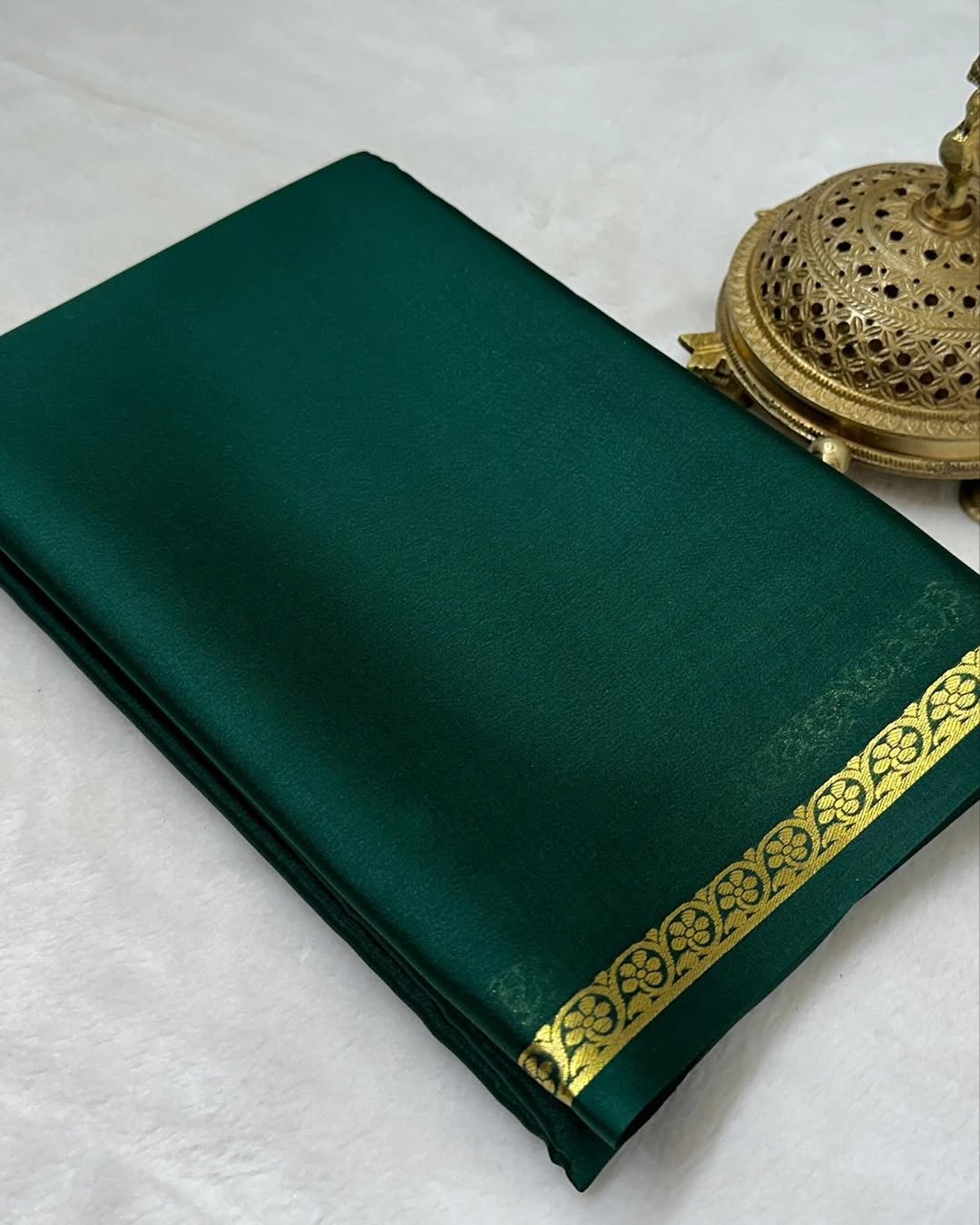 Elegant Solid Silk Blend Saree Featuring Rich Traditional Gold  Border