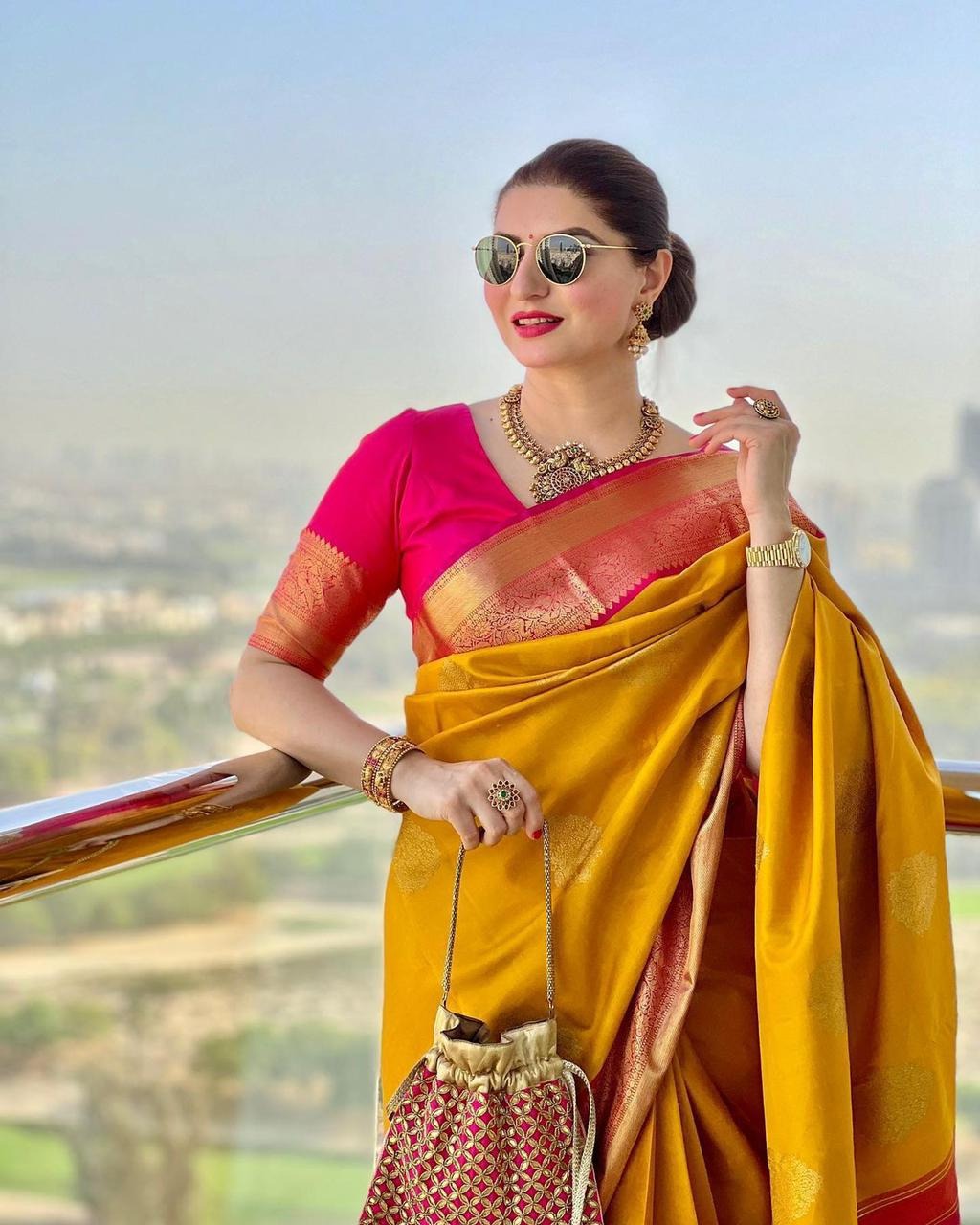 Yellow Soft Banarasi Silk Saree with Jacquard Work and Rich Pink Blouse