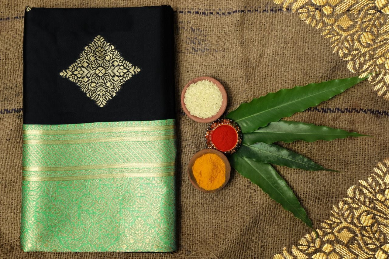 Black Soft Silk Saree with Mint Green Zari Border and Gold Motifs