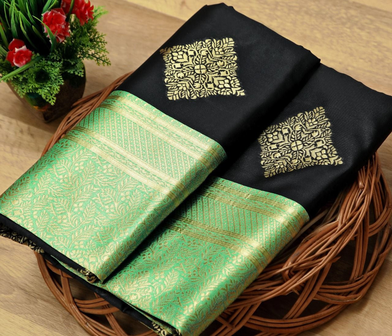 Black Soft Silk Saree with Mint Green Zari Border and Gold Motifs
