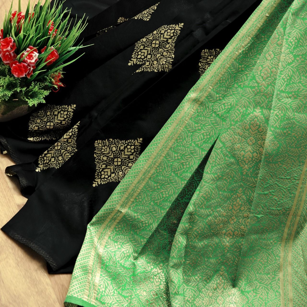 Black Soft Silk Saree with Mint Green Zari Border and Gold Motifs