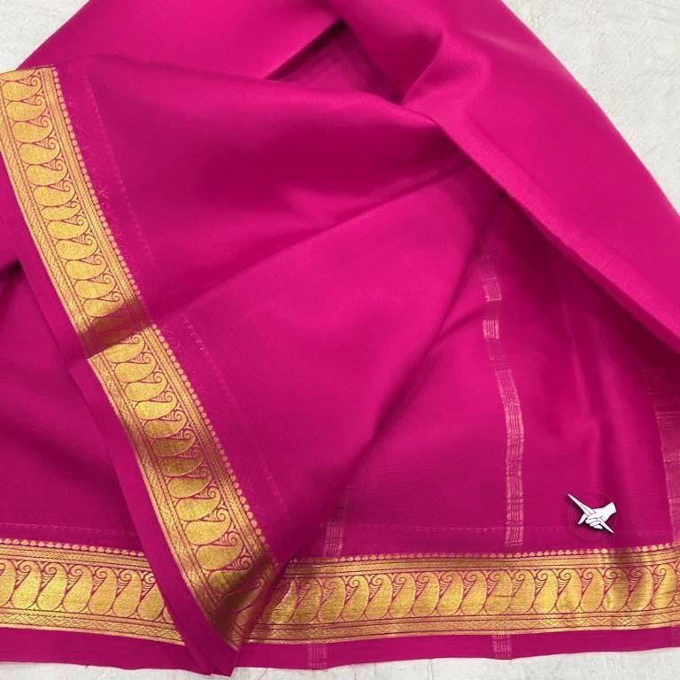 Luxury Mysore silk sarees showcasing beautiful zari border for festive gatherings