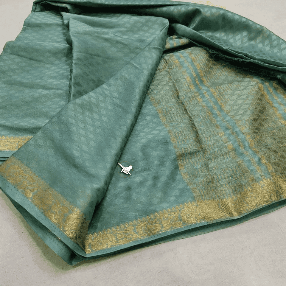 Golden Glimmer: Soft Silk Saree with Line Detailing
