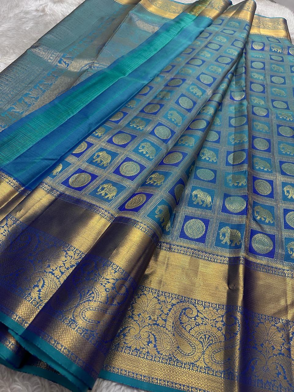 icultural Peacock icultural & Gold Kanchipuram Silk Saree with Paisley & Elephant Motifs