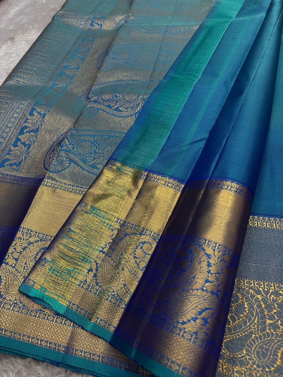 icultural Peacock icultural & Gold Kanchipuram Silk Saree with Paisley & Elephant Motifs