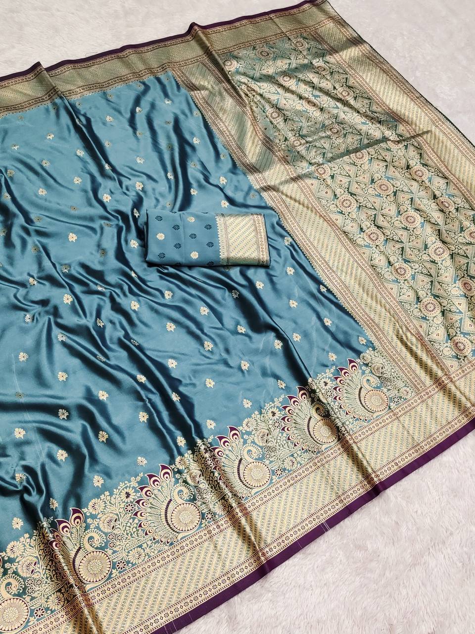 Royal icultural Blue Satin Silk Saree with Peacock Motif Border and Intricate Zari Pallu