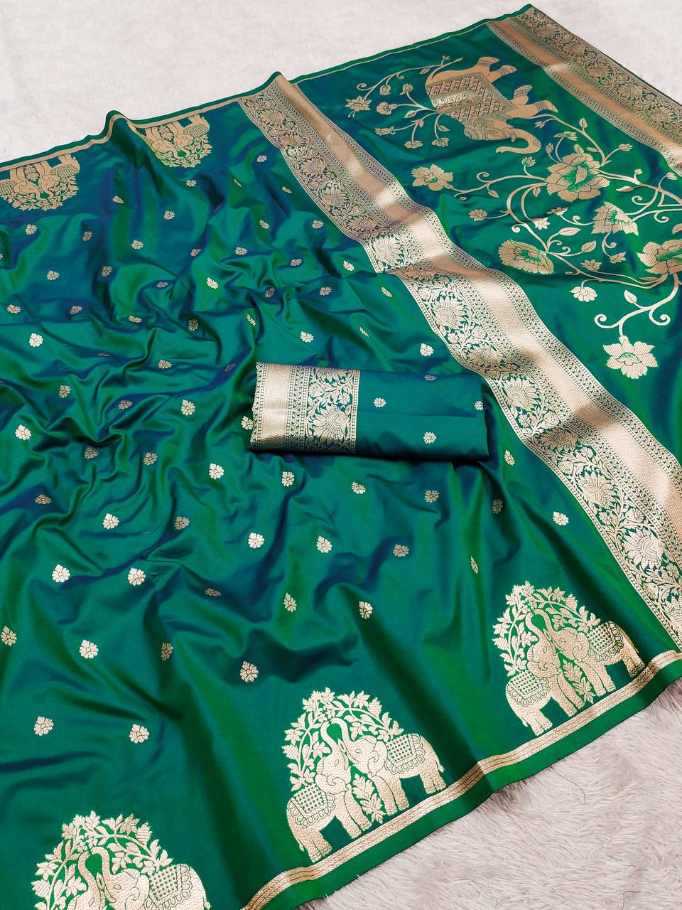 Emerald icultural Green Silk Saree with Gold Zari Elephant Motifs & Ornate Border