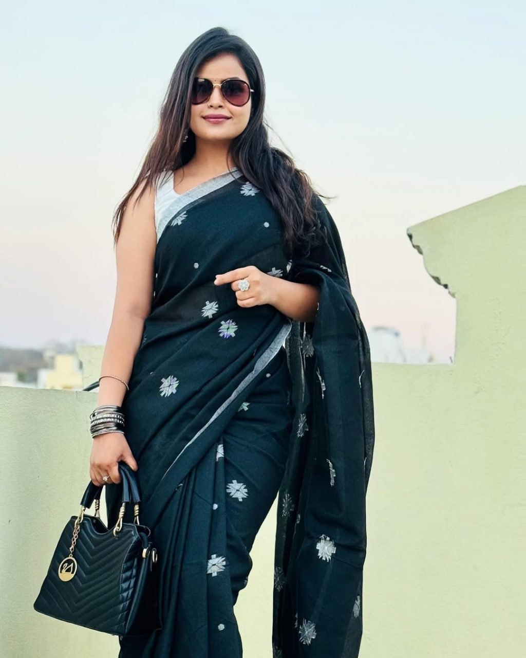 Classic Black Soft Chiffon Saree with Silver Floral Motifs and Minimal Border