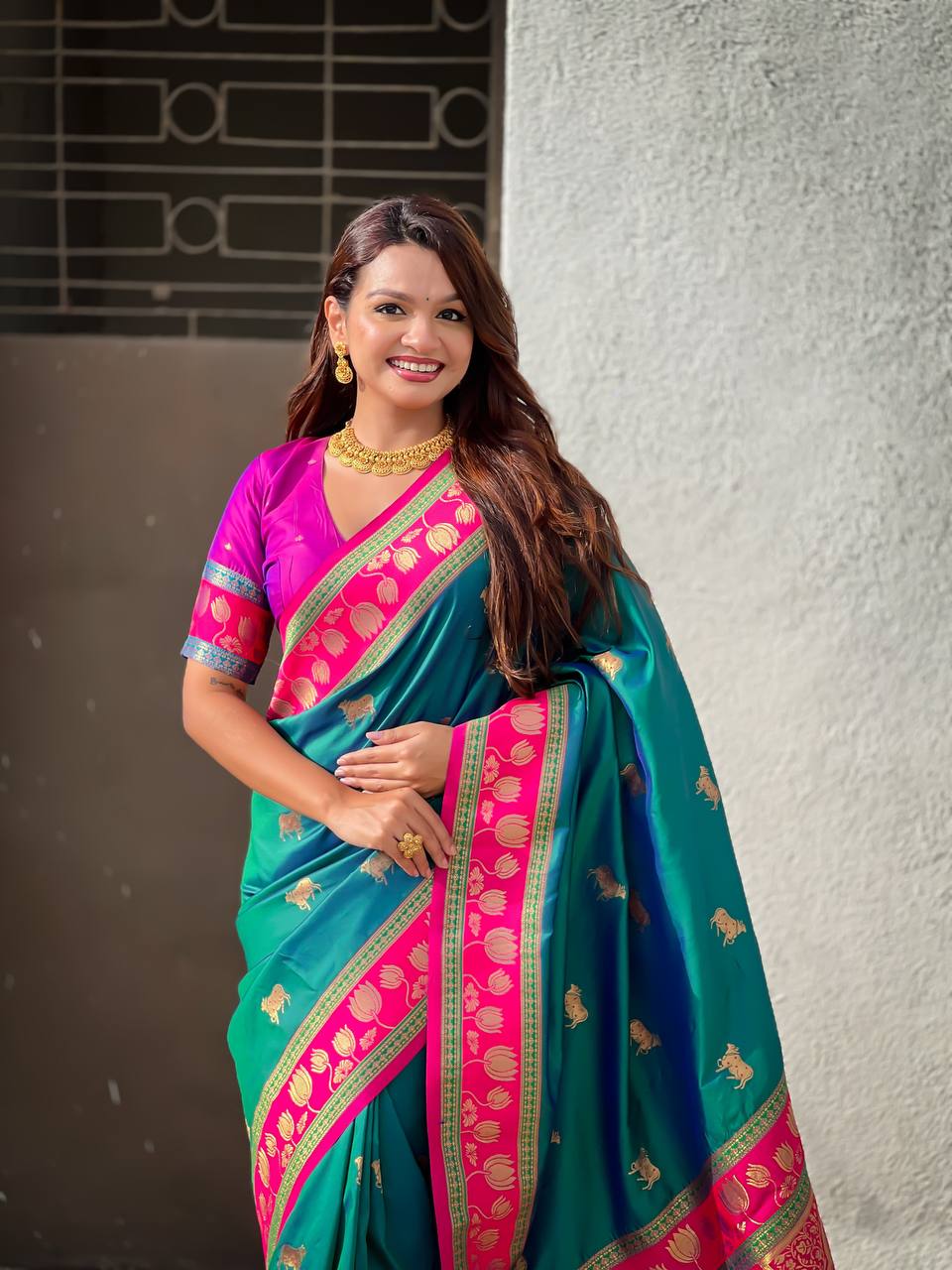 icultural Green & Rani Pink Premium Luxury Silk Saree with Elephant Zari Motifs & Grand Lotus Border