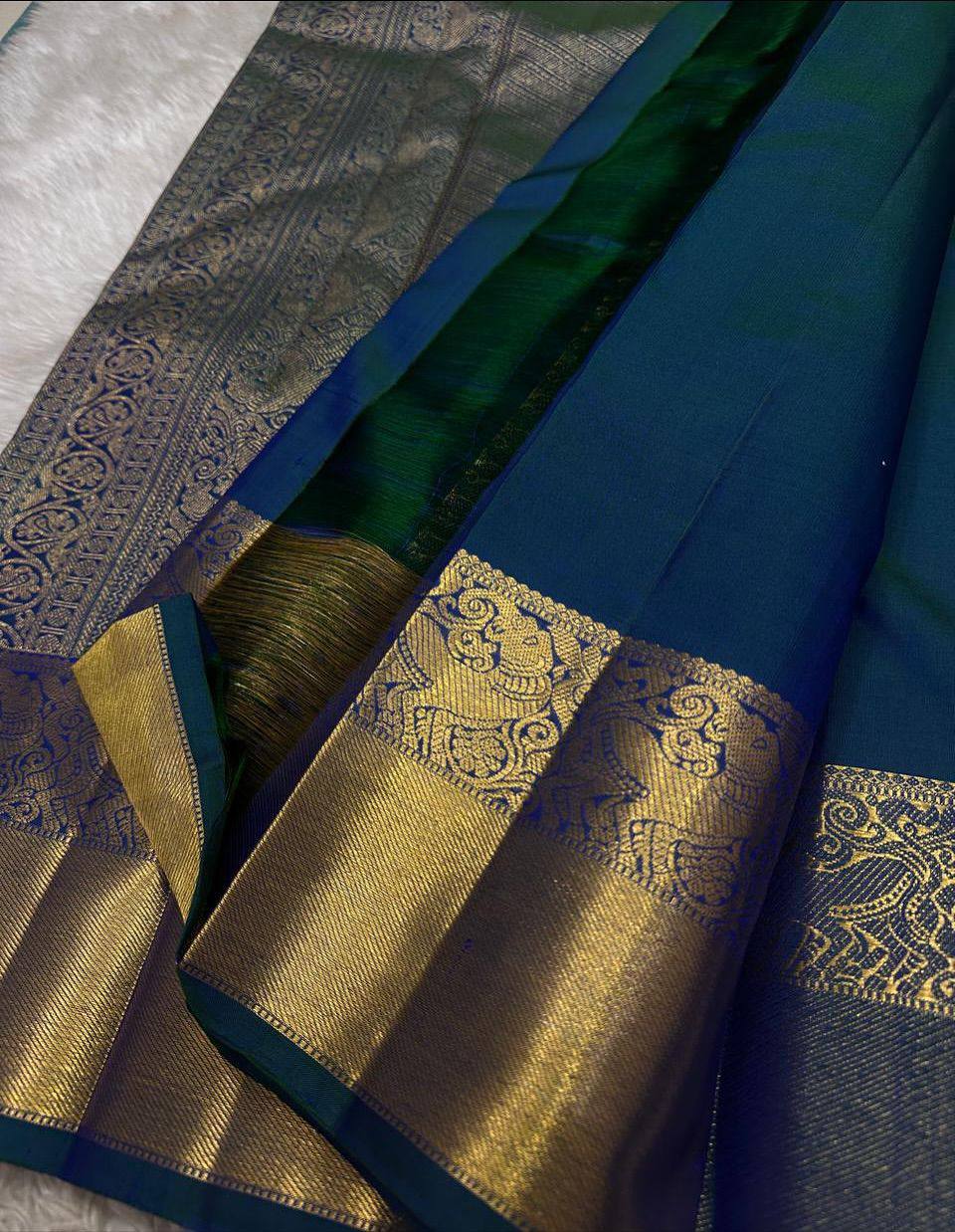 Royal icultural Blue Premium Luxury Silk Saree with icultural Gold Zari Floral Weave & Regal Border