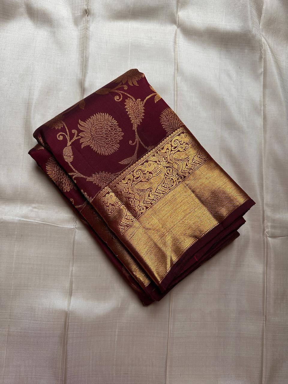 Crimson Royale Premium Luxury Silk Saree with All-Over icultural Gold Floral Zari Weave & Grand Heritage Border