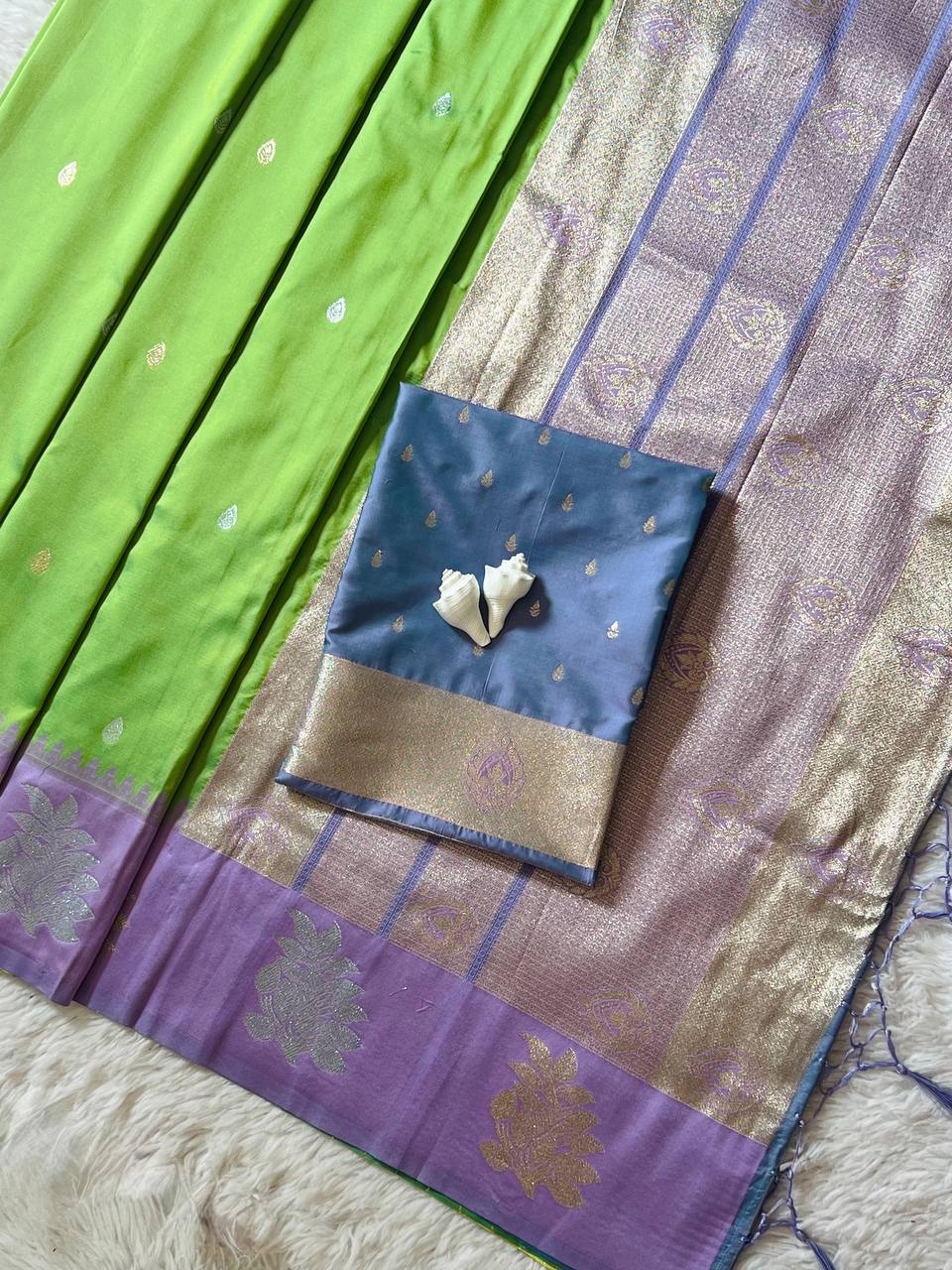 Parrot Green Luxury Silk Saree with icultural Purple Banarasi Border & Silver Zari Butta Motifs