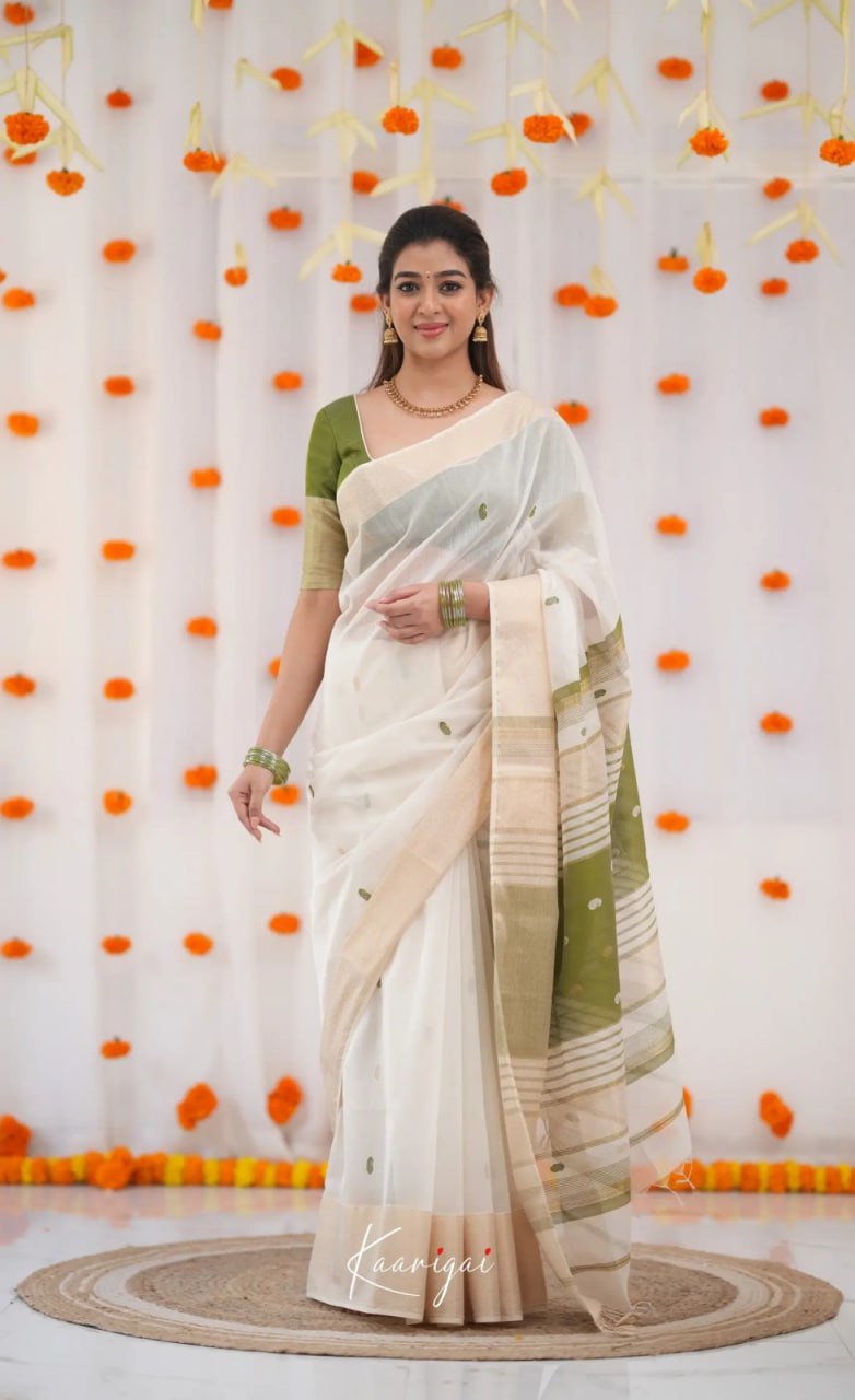 Elegant icultural White Cotton Saree with Olive Green Border – Minimal Festive Look