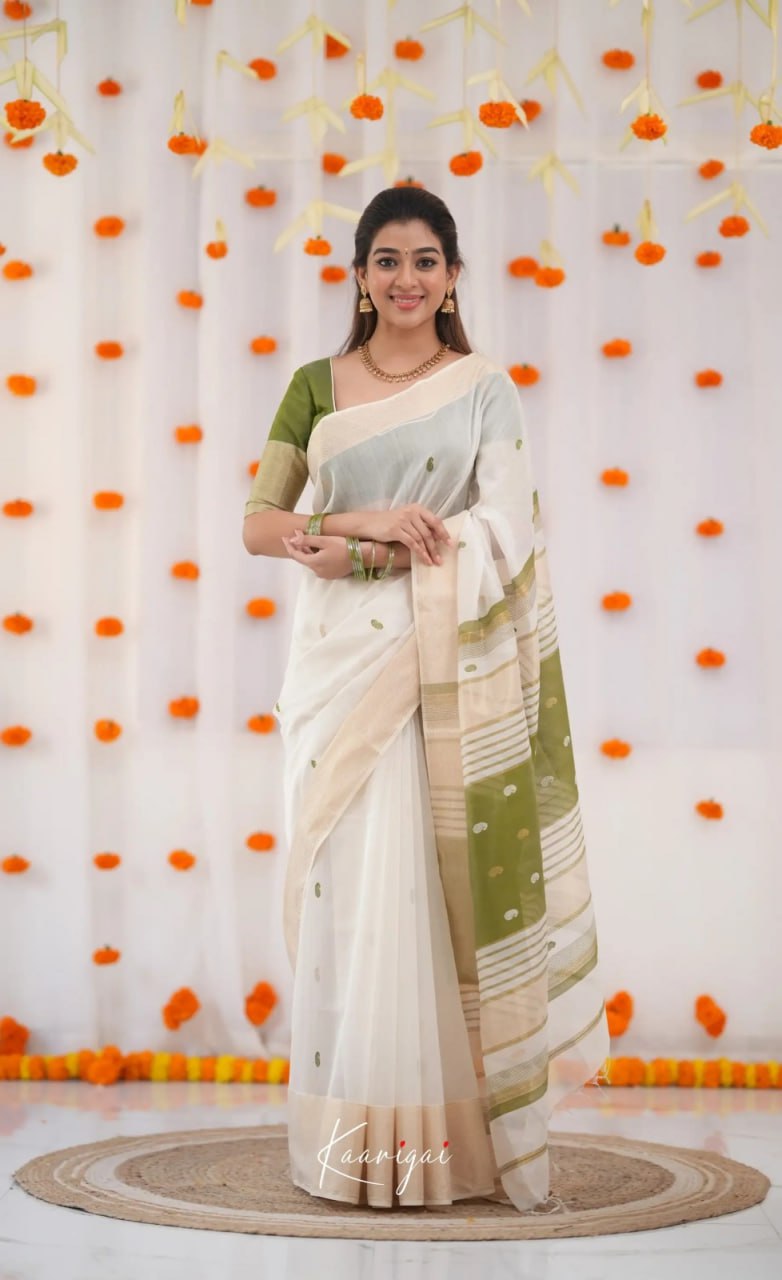 Elegant icultural White Cotton Saree with Olive Green Border – Minimal Festive Look