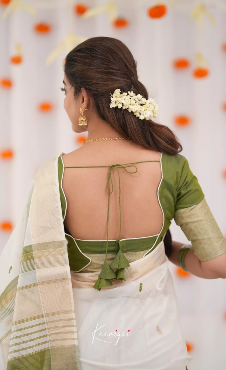 Elegant icultural White Cotton Saree with Olive Green Border – Minimal Festive Look