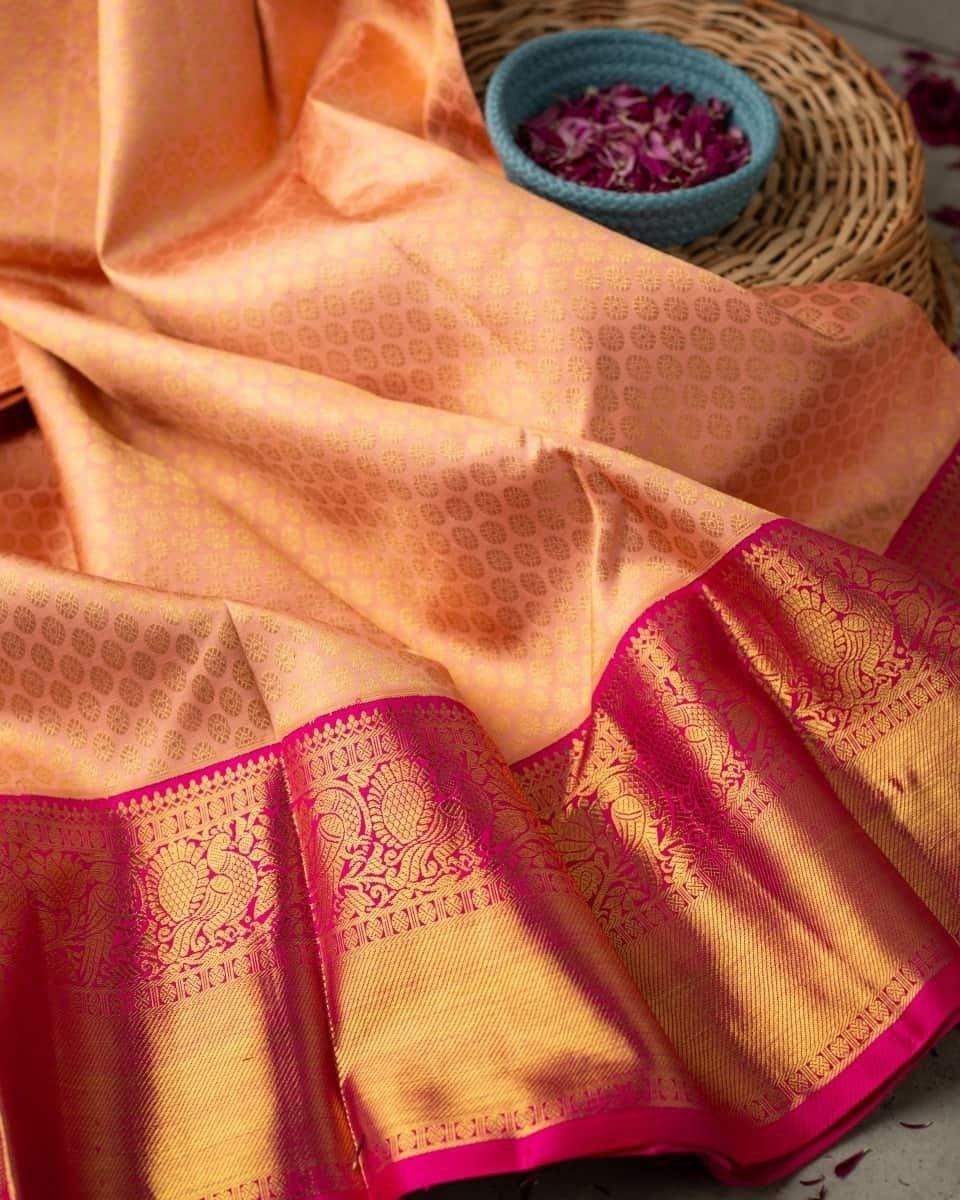 Peach Soft Banarasi Silk Saree with Pink Jacquard Zari Border