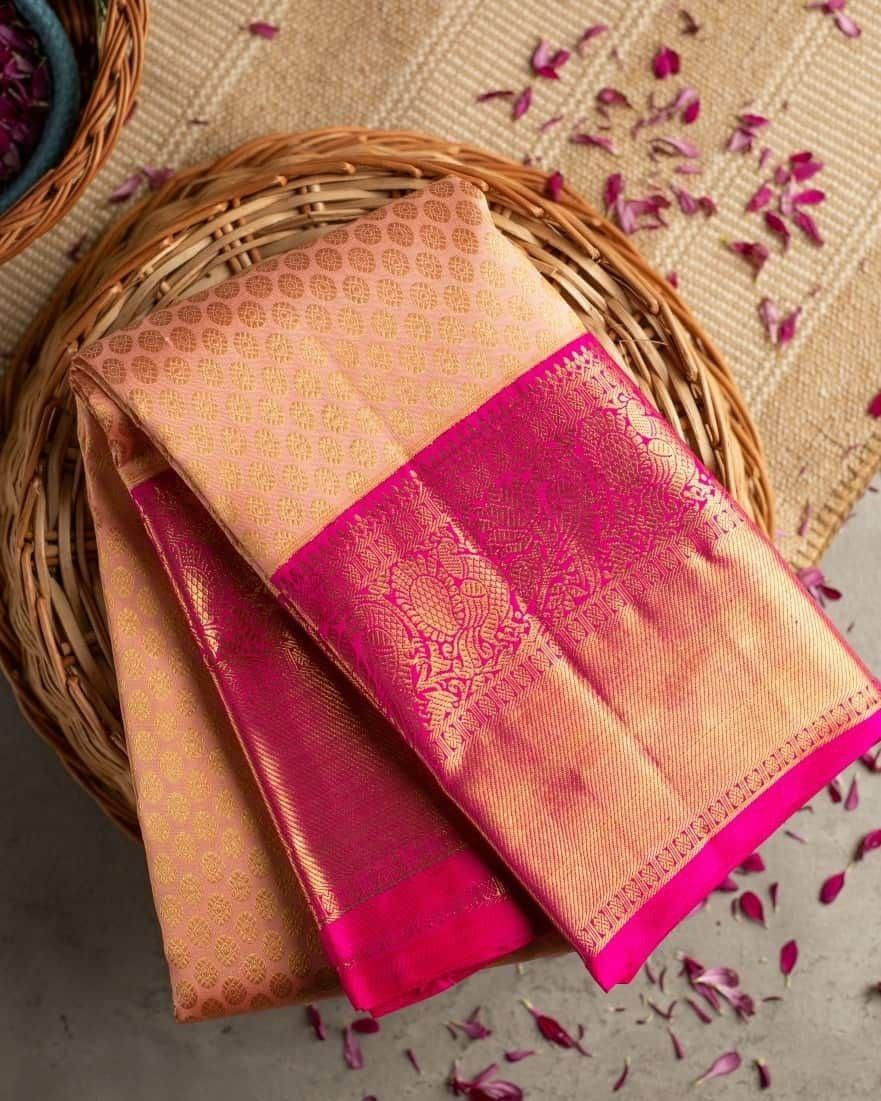 Peach Soft Banarasi Silk Saree with Pink Jacquard Zari Border