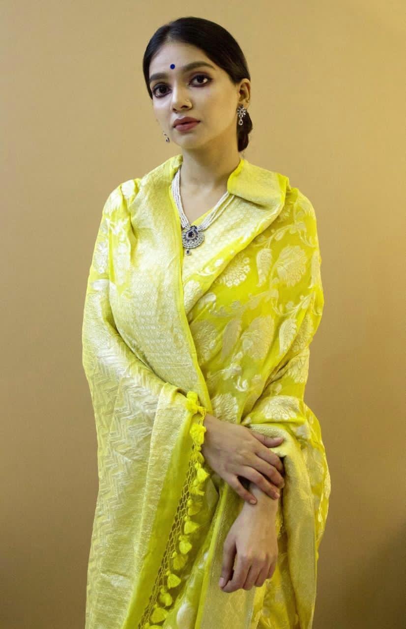 Yellow Soft Silk Saree with Self-Jacquard Weaving and Tassel Border